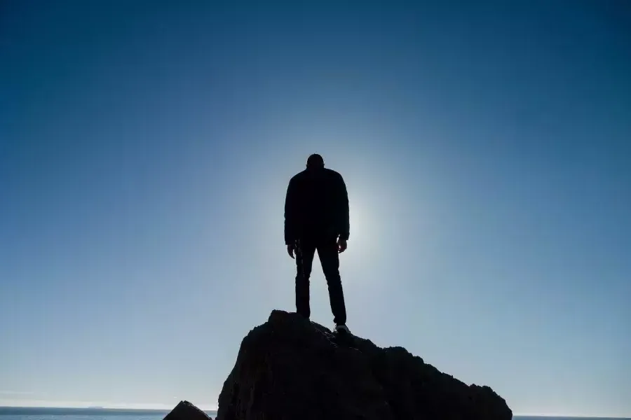 Nick Whittlesey standing on a rock.